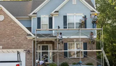 Siding repair service in Indianapolis, IN for damaged exterior siding on a home